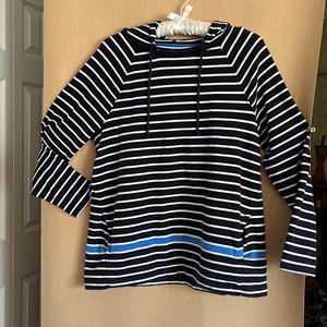 A sweater long sleeves with a hood